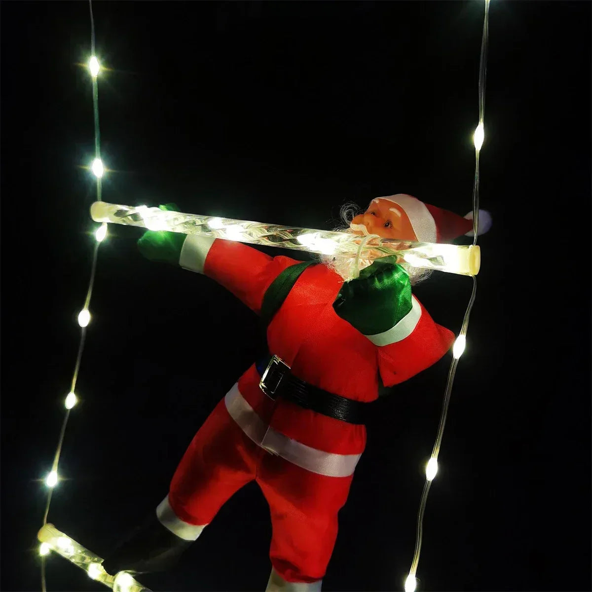 Christmas decoration Santa Claus climbing tree with string lights.